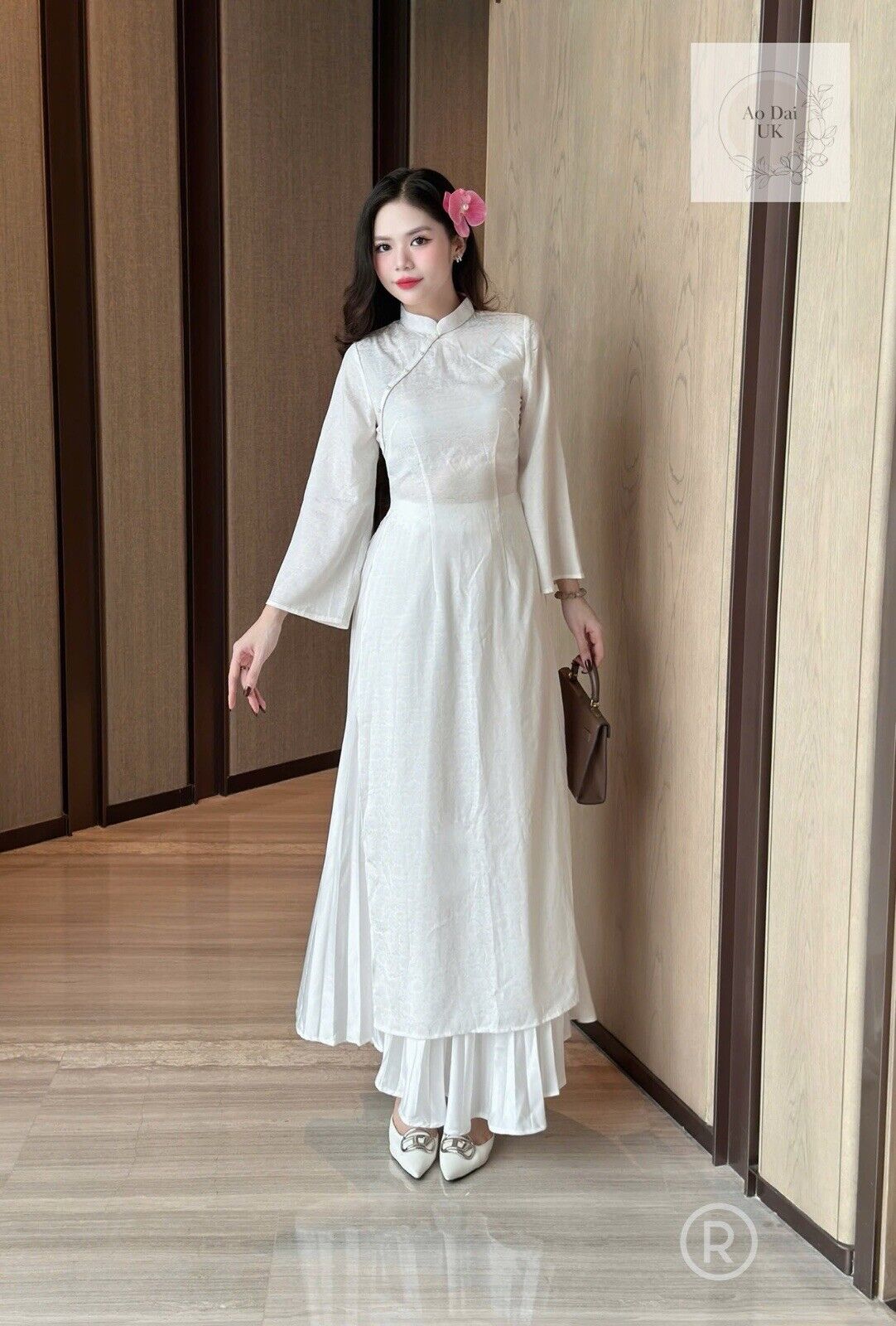 White silk ao dai with inner skirt