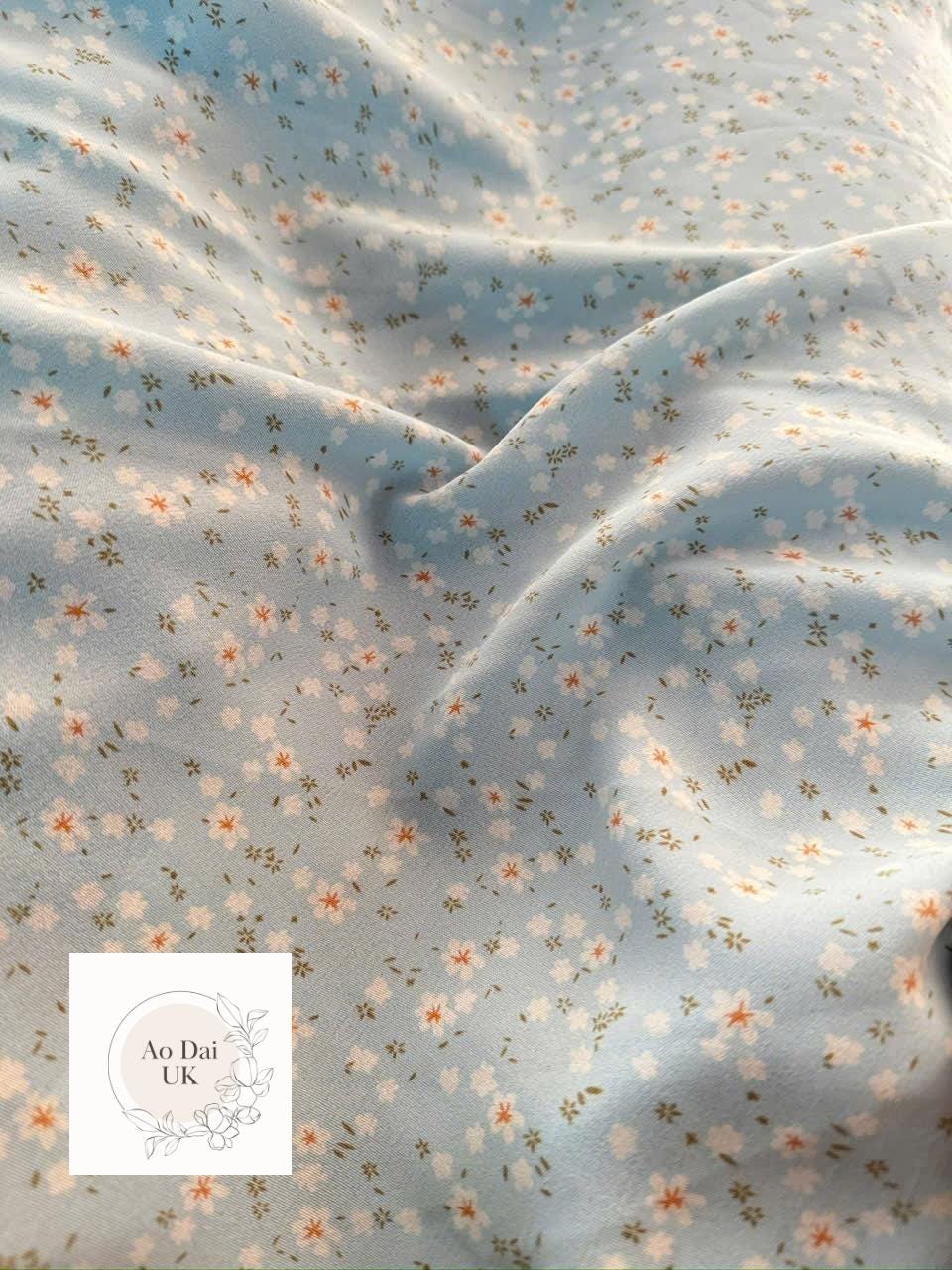 Pastel blue Women ao dai with puff sleeves- Limited edition