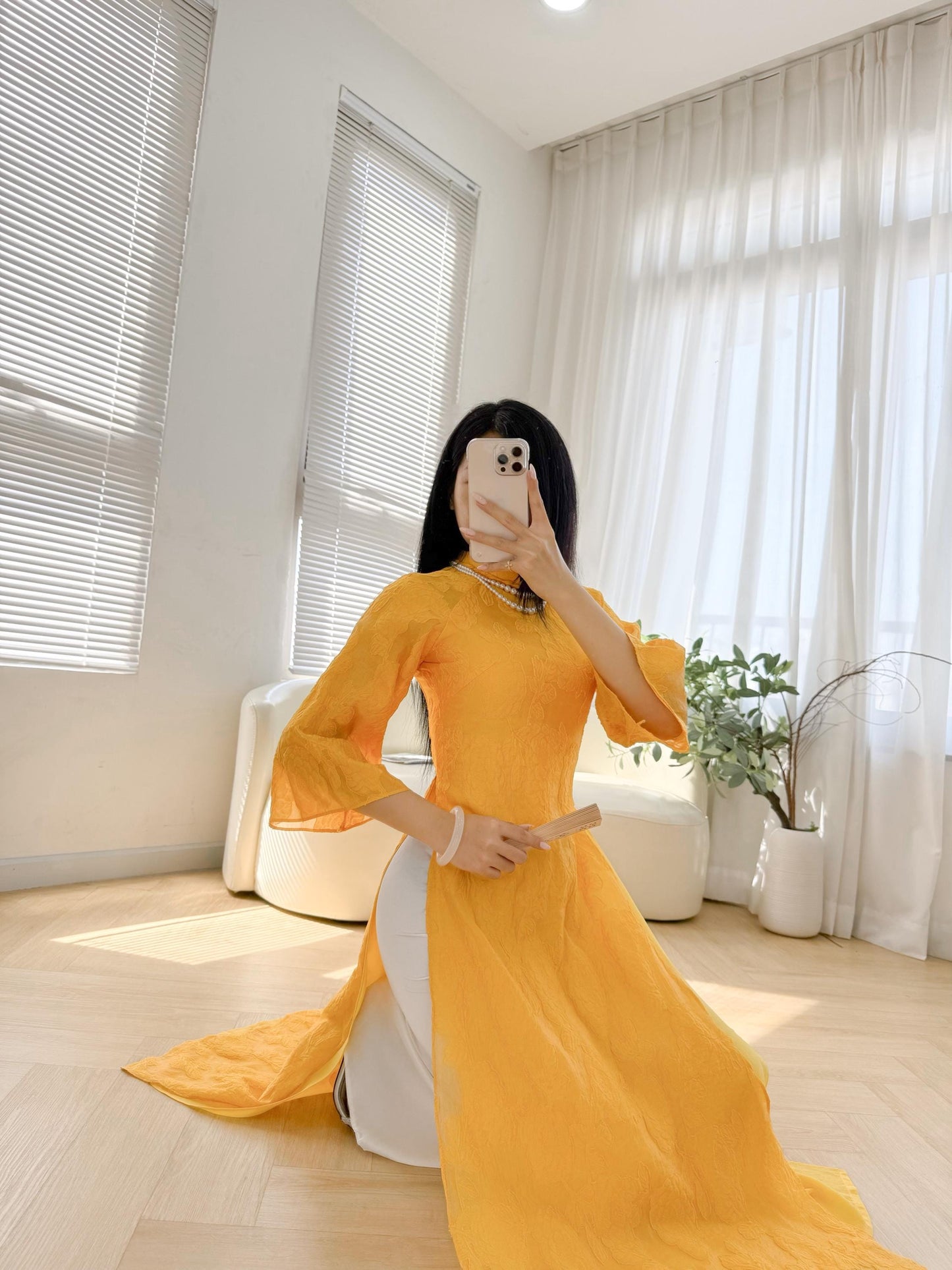 Vietnamese crepe áo dài in yellow