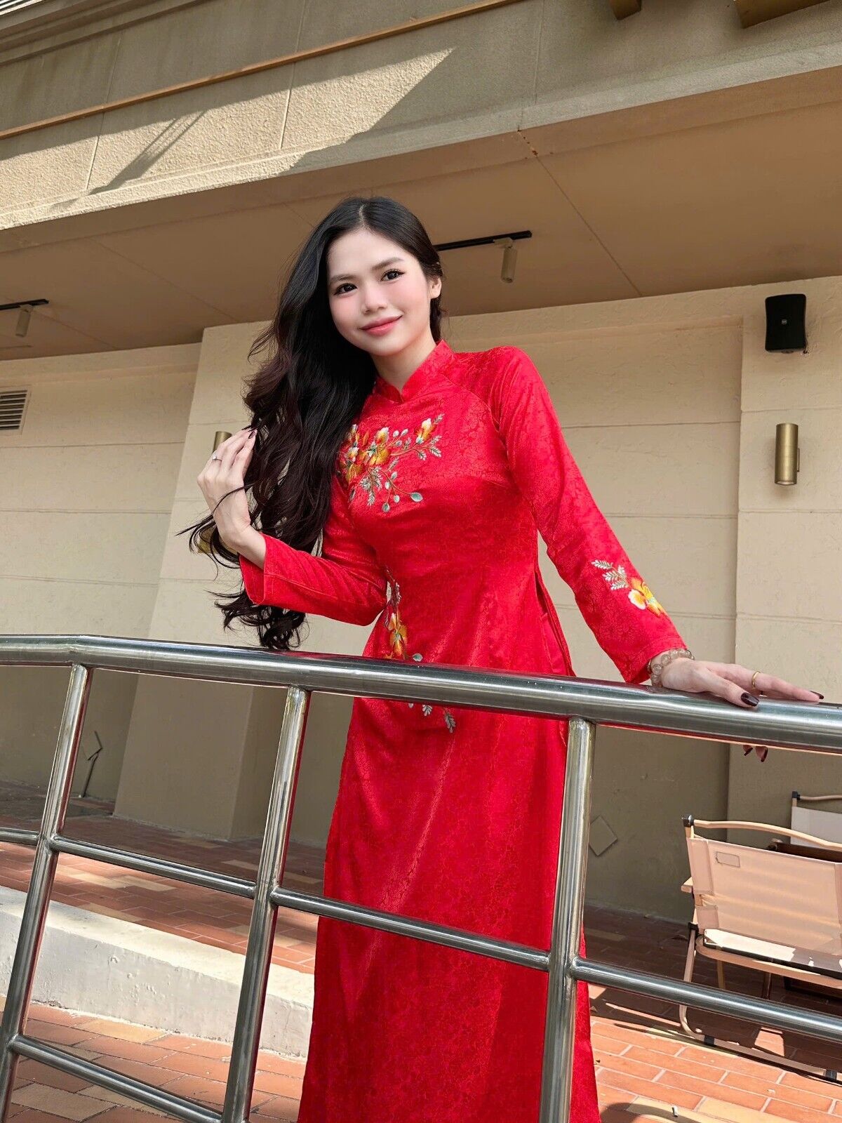 Vietnamese silk Ao dai with poinciana flower embroidery