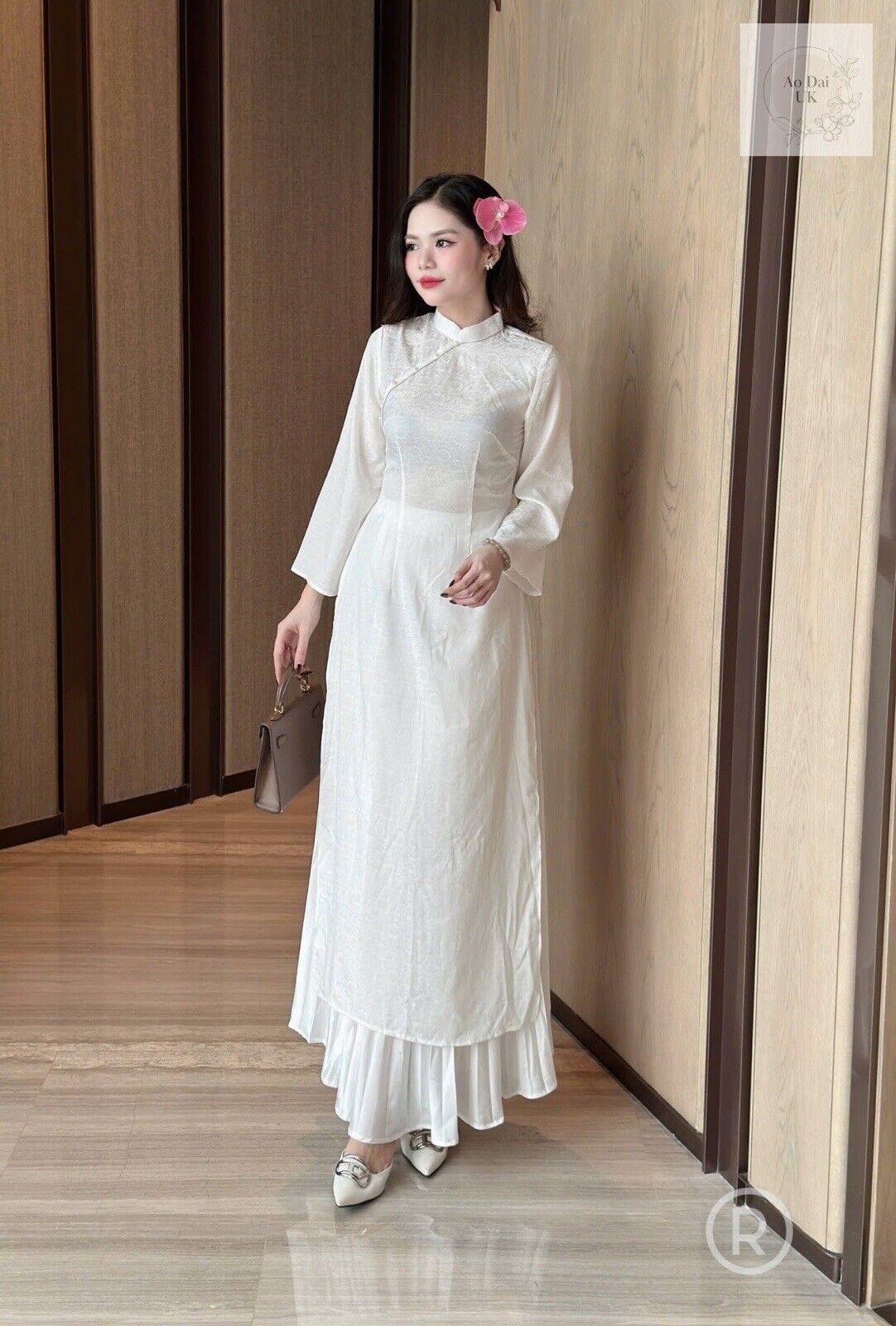 White silk ao dai with inner skirt