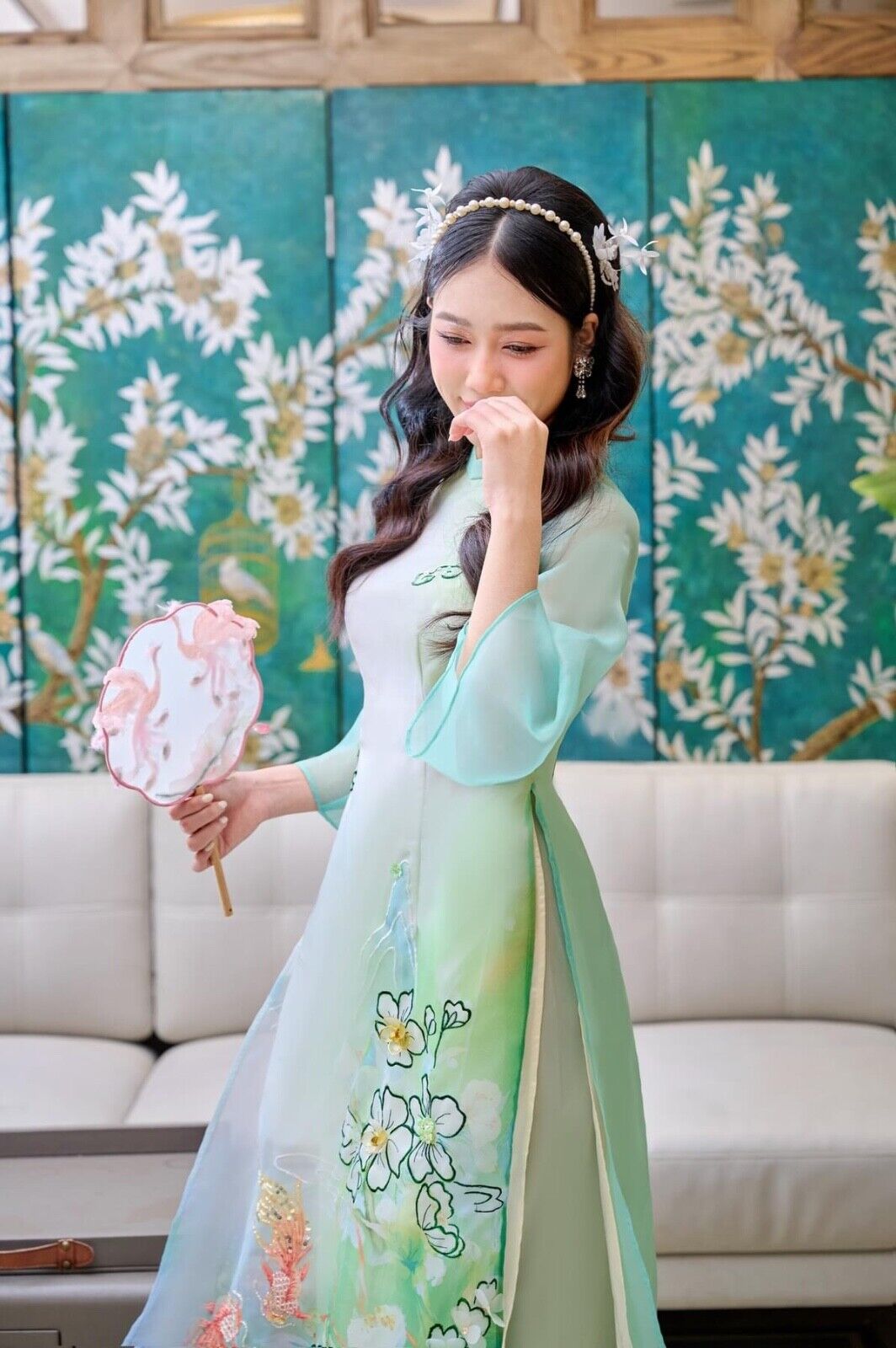 Modern Ao dai with koi fish embellishments