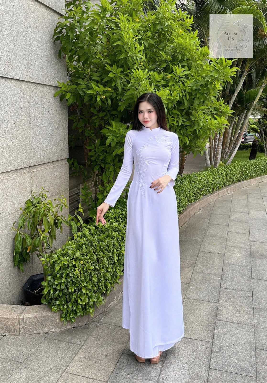 Vietnamese white Ao dai with floral embroidery - Vietnamese traditional dress