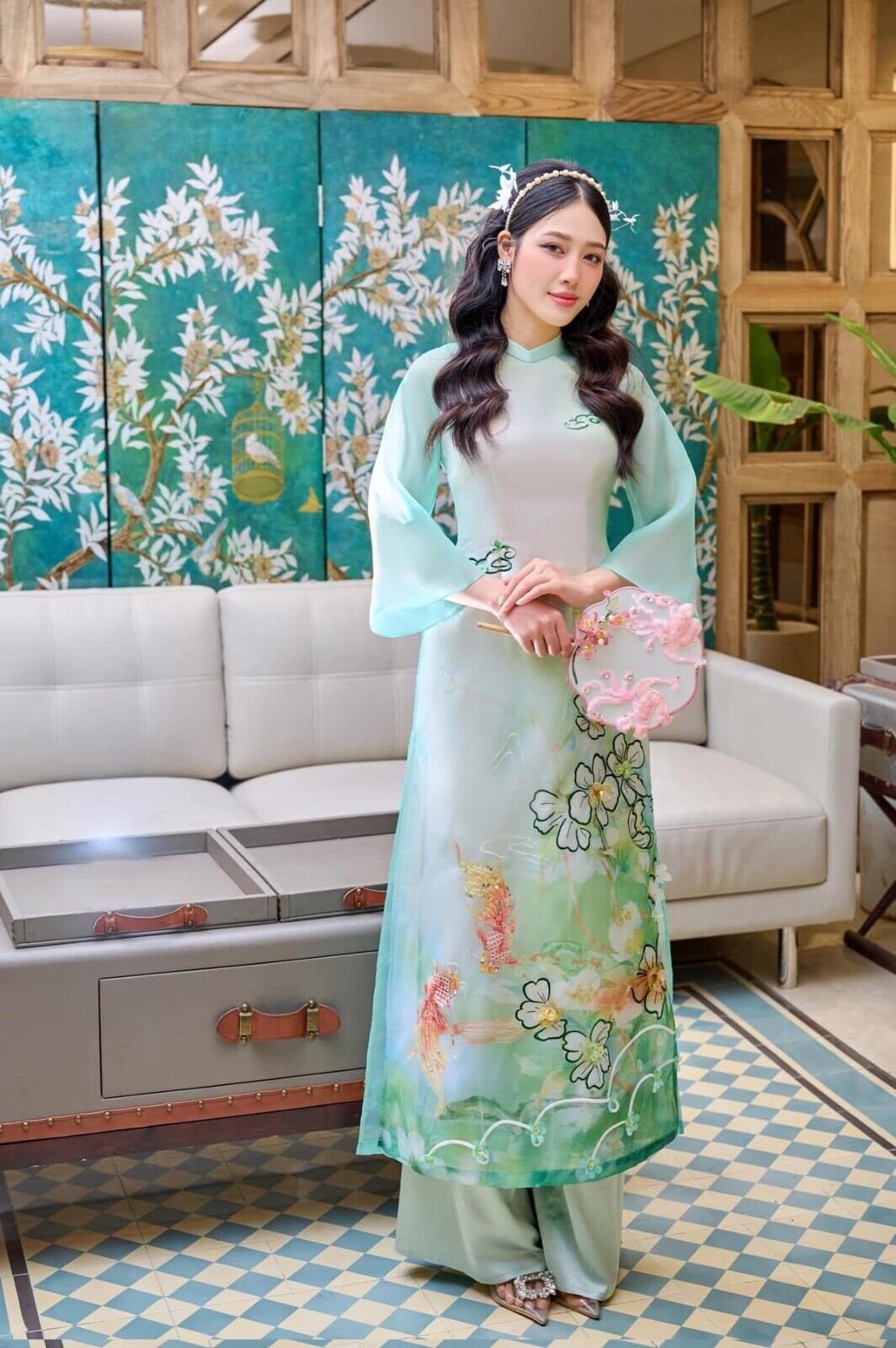 Modern Ao dai with koi fish embellishments