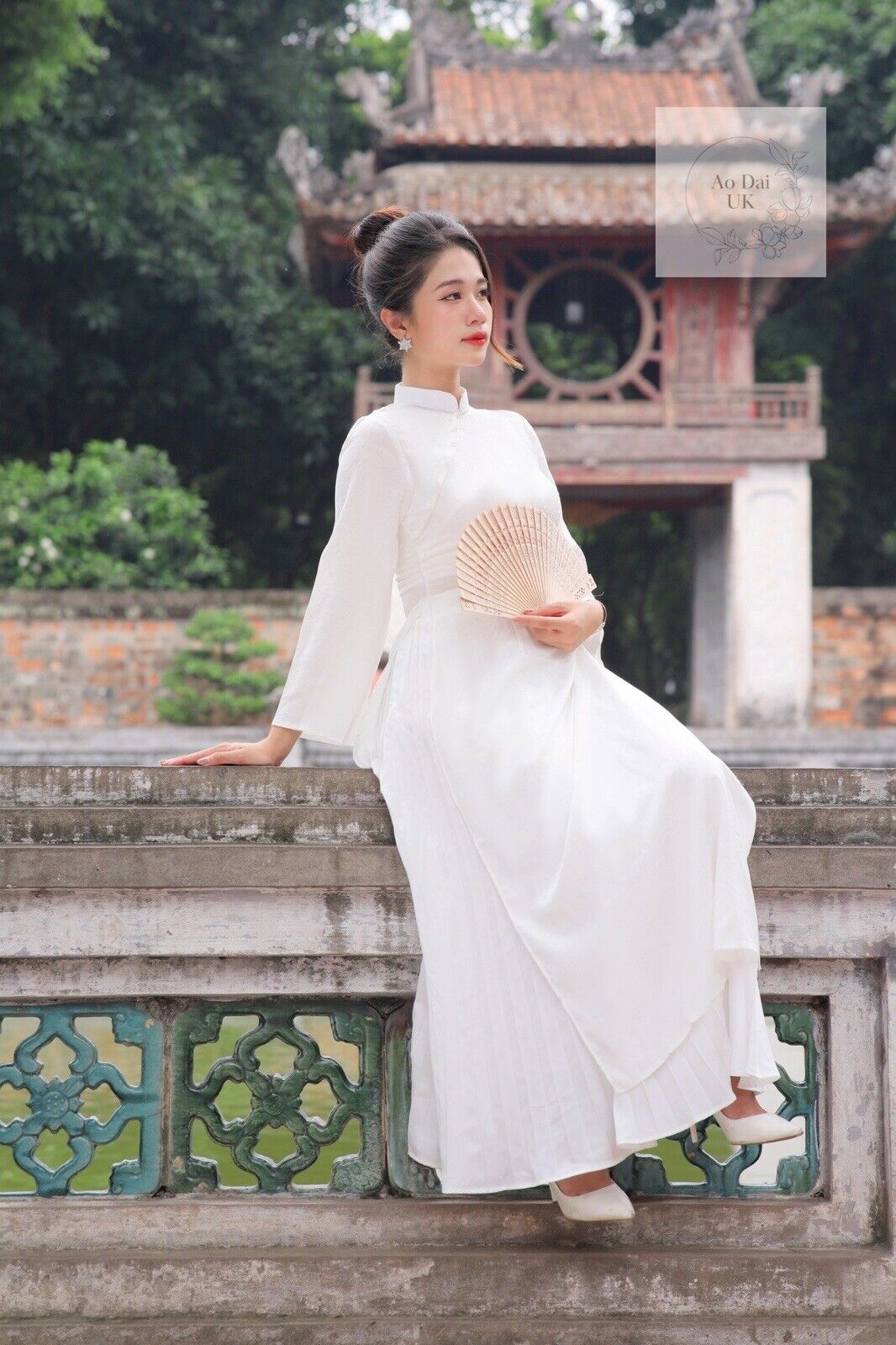 White silk ao dai with inner skirt