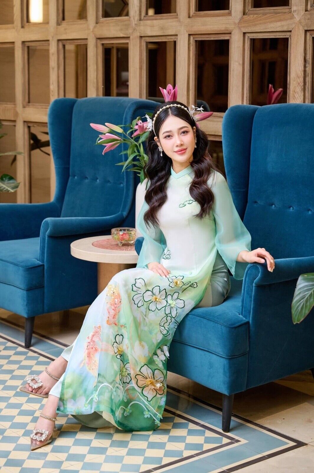 Modern Ao dai with koi fish embellishments