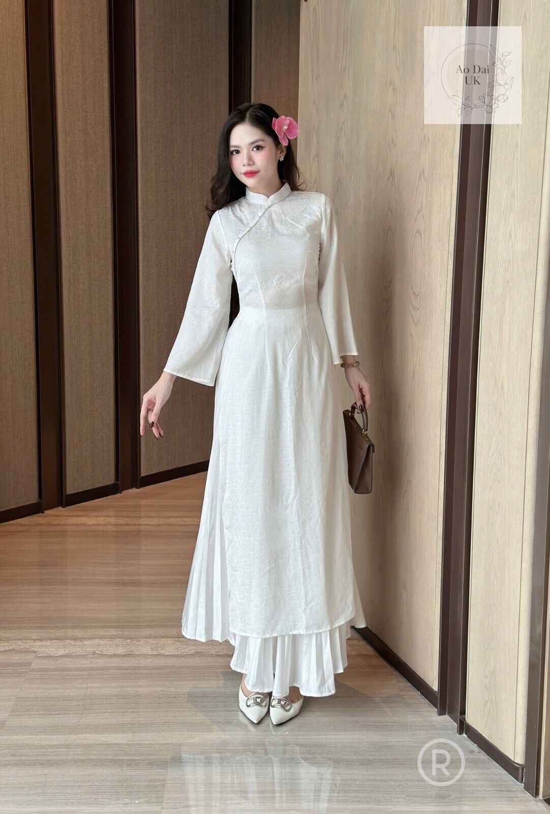 White silk ao dai with inner skirt