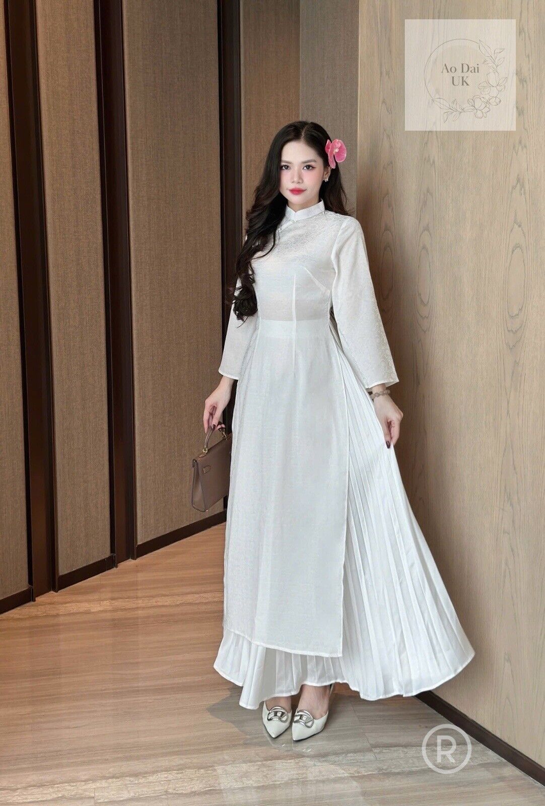 White silk ao dai with inner skirt