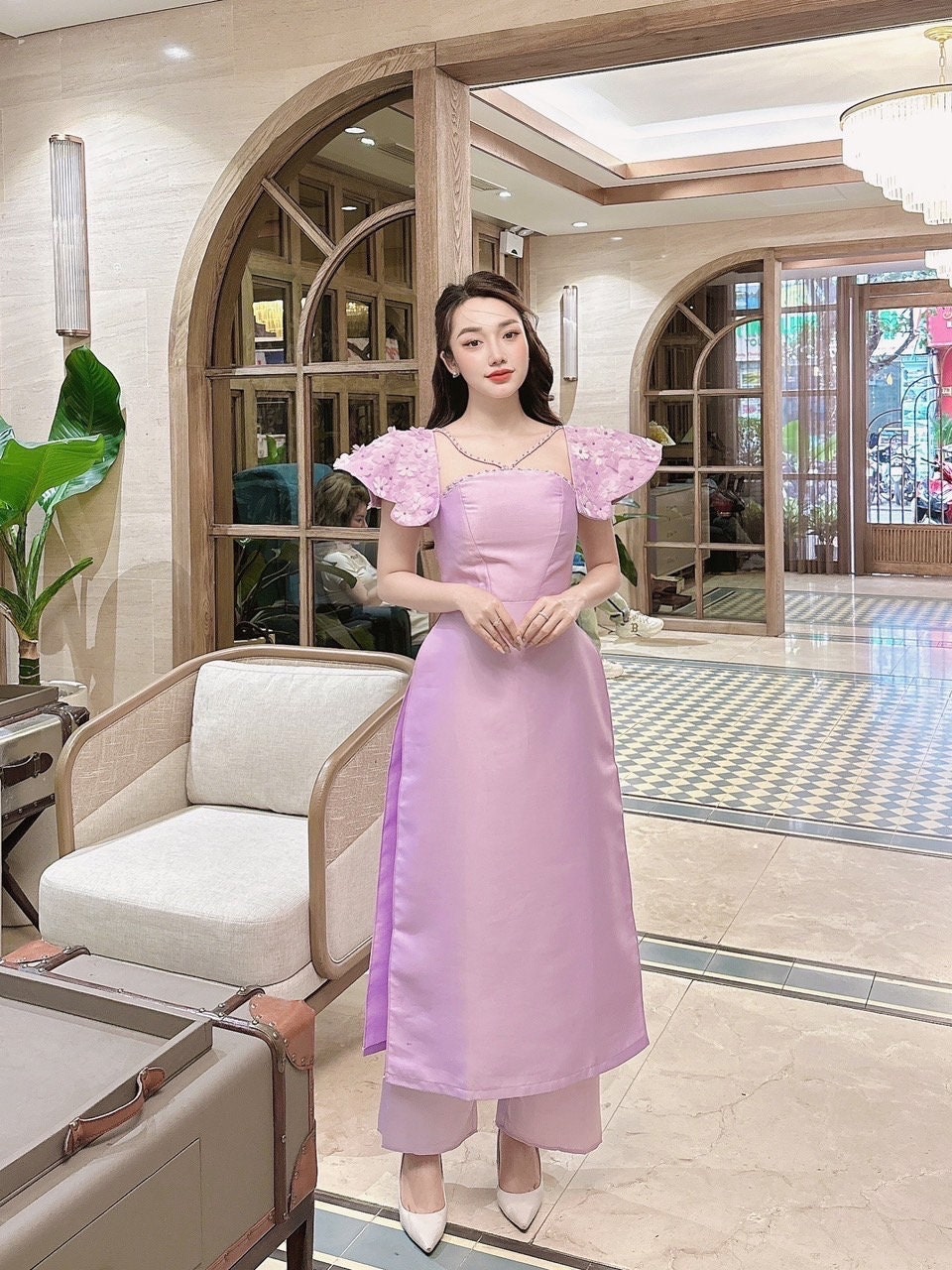 Vietnamese traditional áo dài with 3D flower embellishments- Ao Dai cach tan