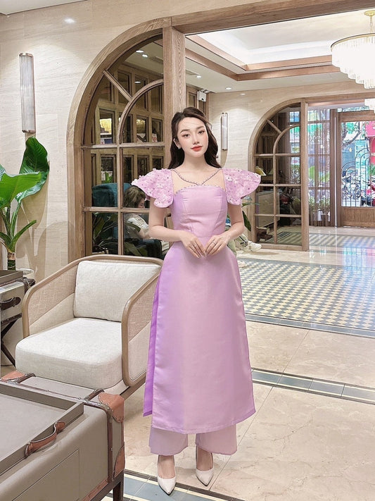 Vietnamese traditional áo dài with 3D flower embellishments- Ao Dai cach tan