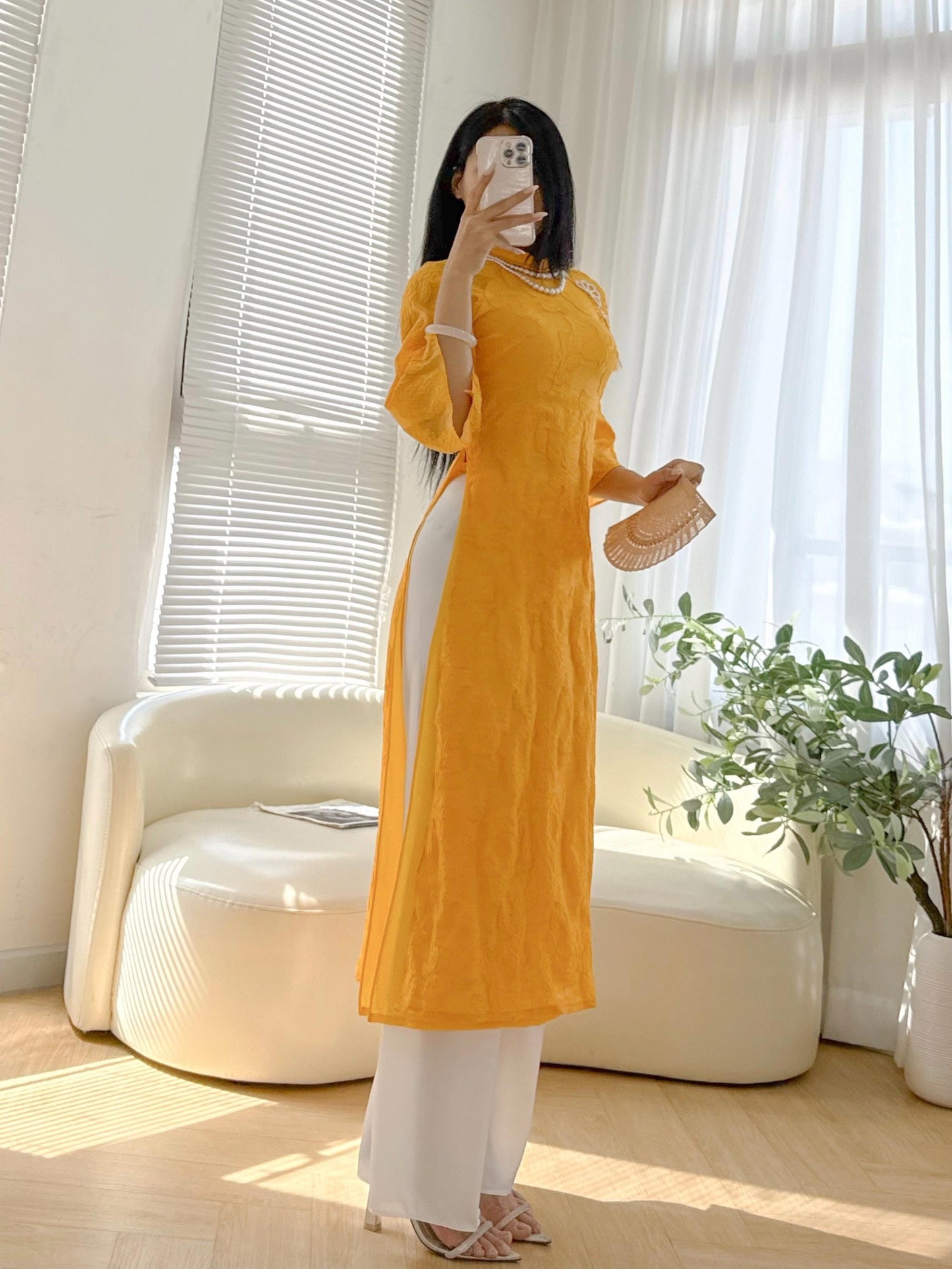 Vietnamese crepe áo dài in yellow