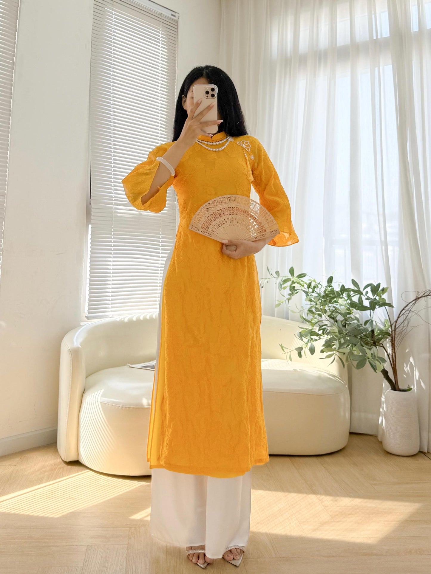 Vietnamese crepe áo dài in yellow