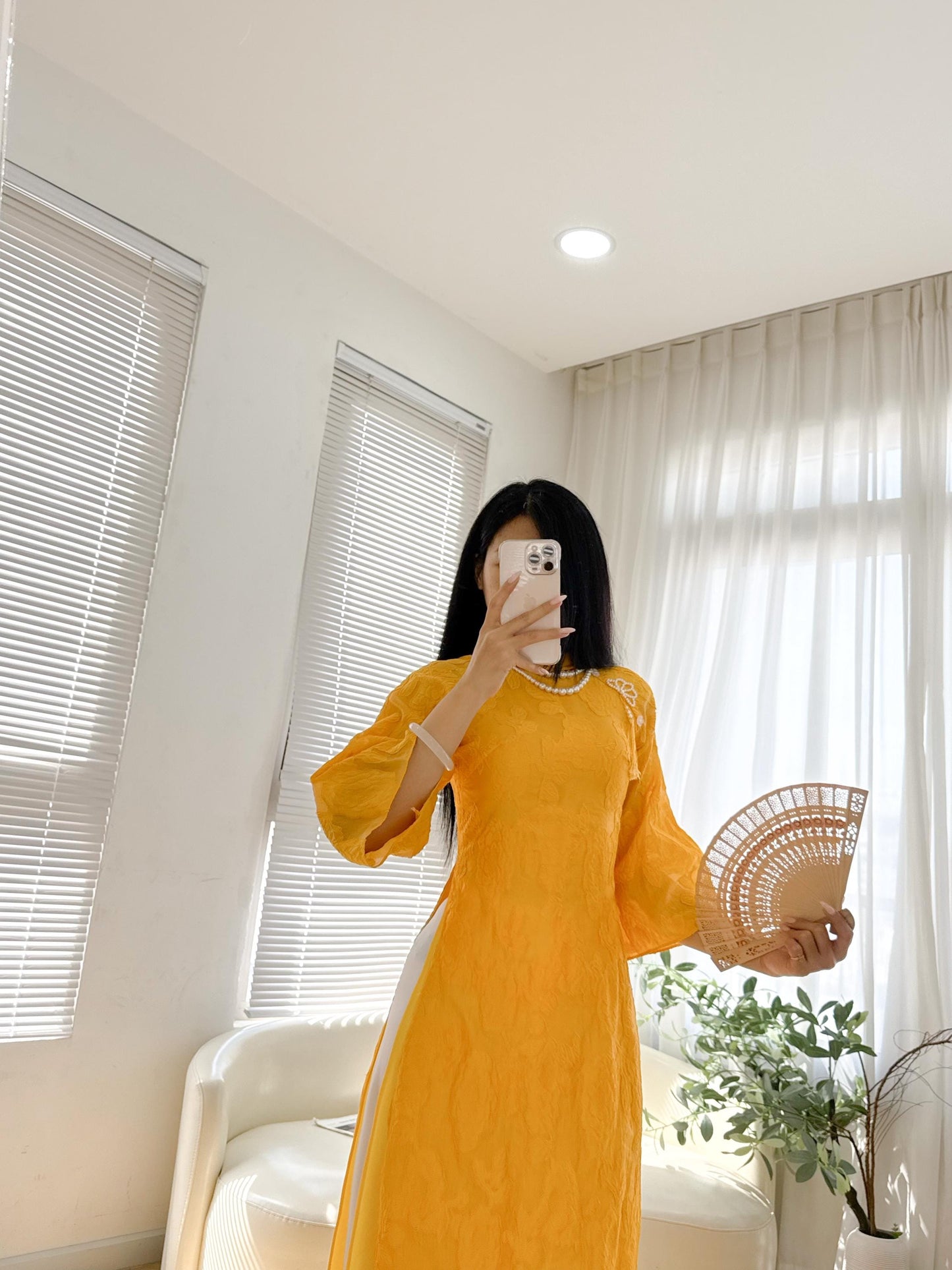 Vietnamese crepe áo dài in yellow