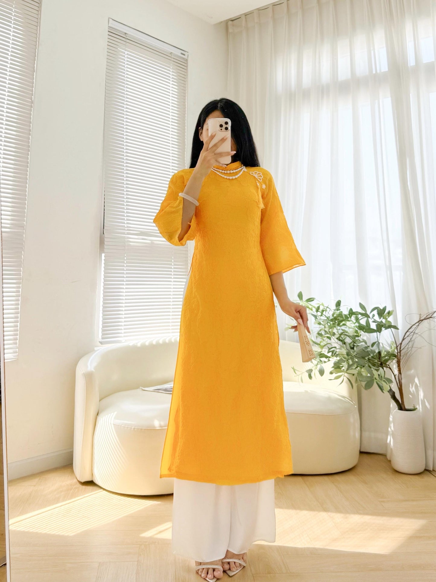 Vietnamese crepe áo dài in yellow
