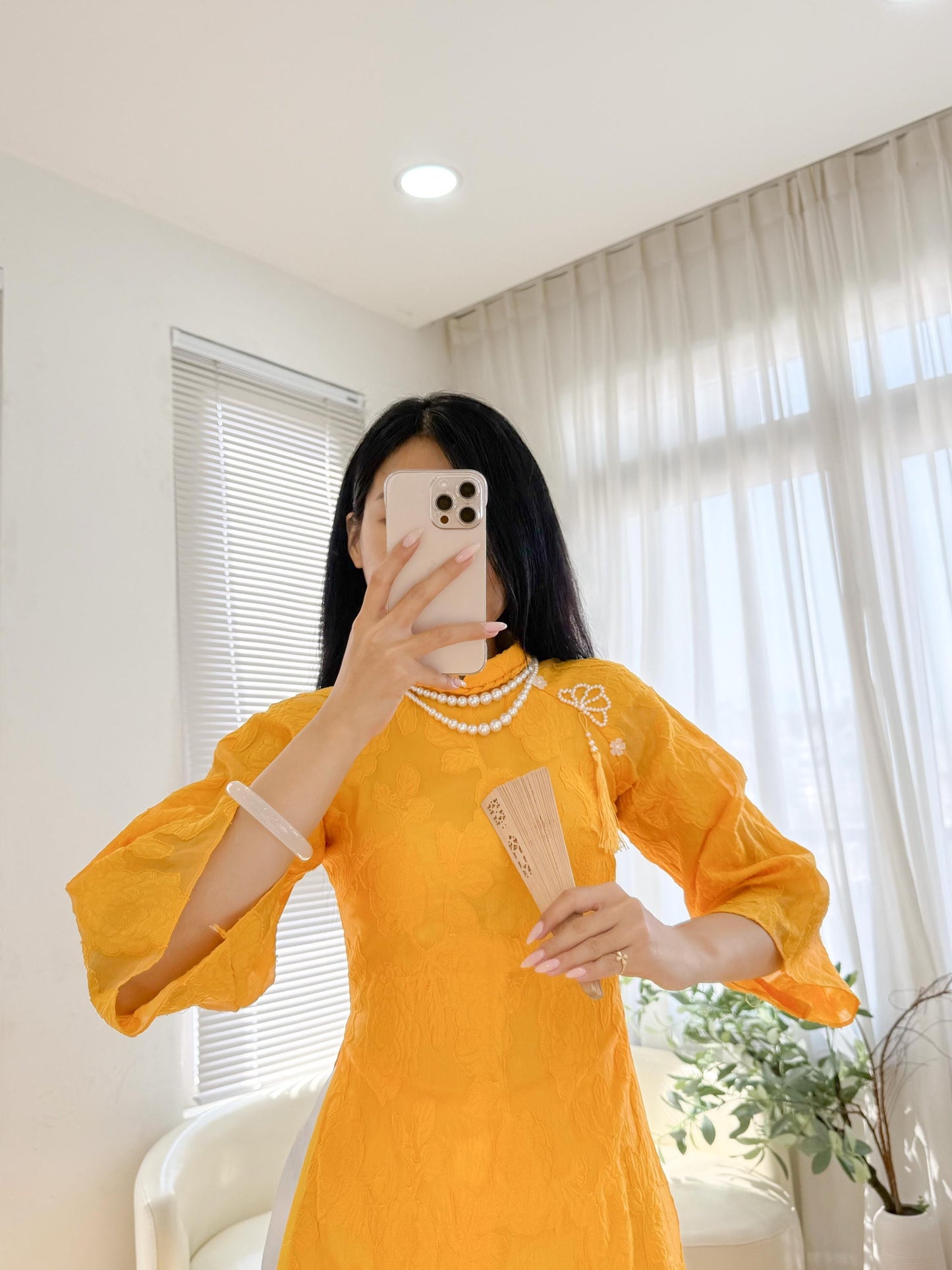 Vietnamese crepe áo dài in yellow