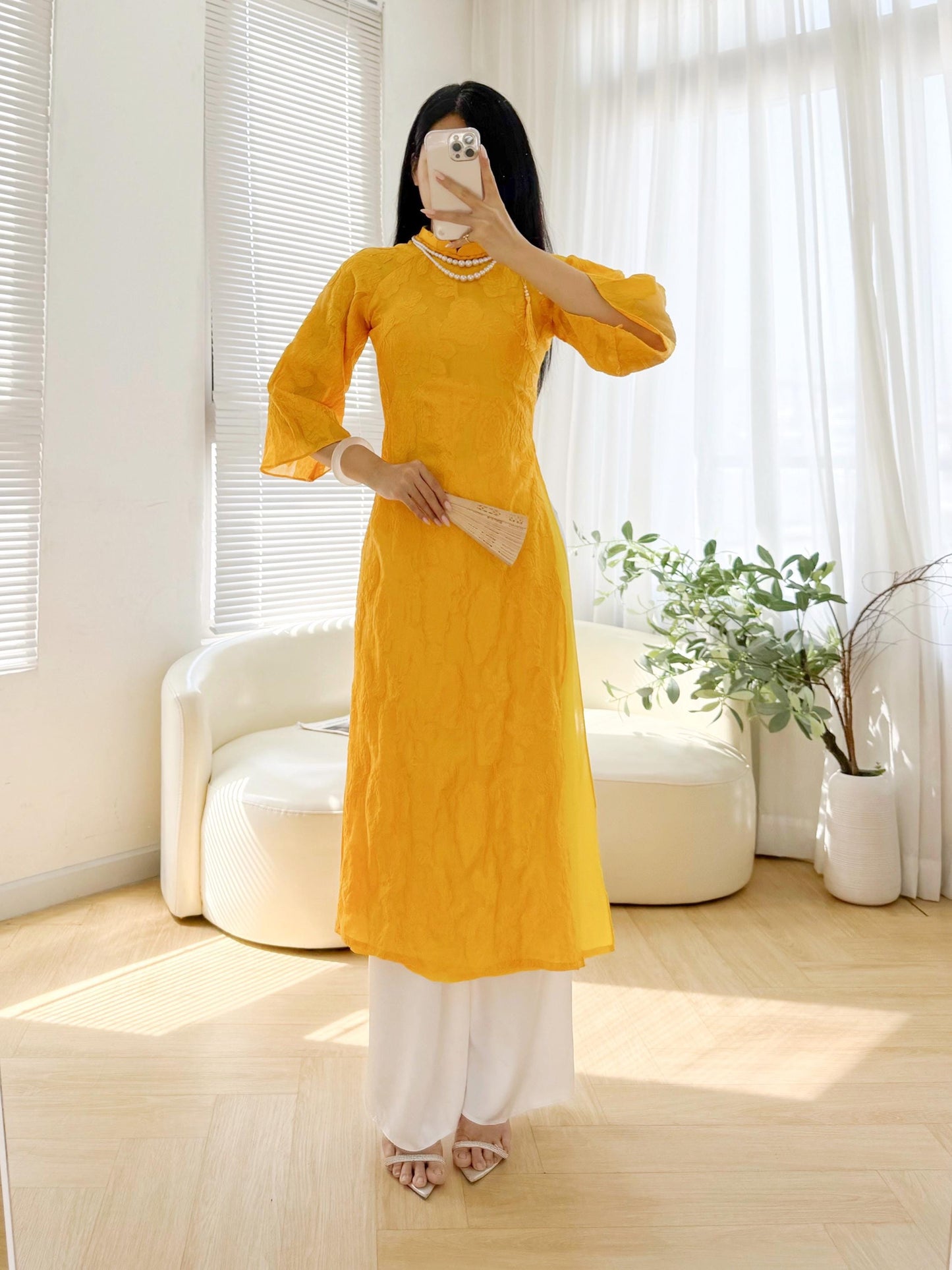 Vietnamese crepe áo dài in yellow